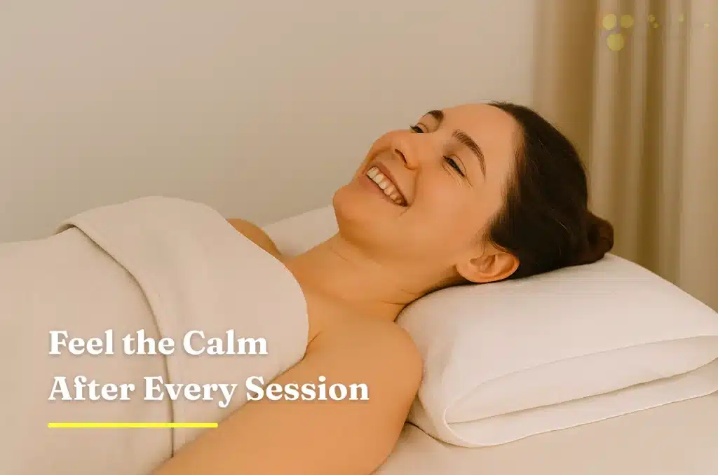 Smiling woman resting post-acupuncture session in relaxing setting.